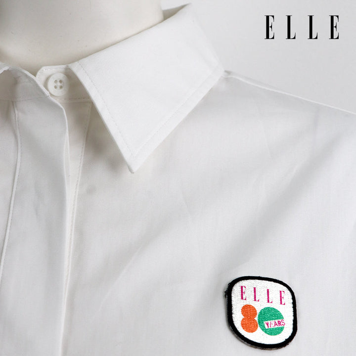 ELLE เสื้อเชิ๊ตสตรีผ้า COTTON แขนยาว ทรง CROP ติดชิ้นโลโก้ LIMITED EDITION COLLECTION ELLE 80 YEARS ที่อก รุ่น W3B392 ELLE