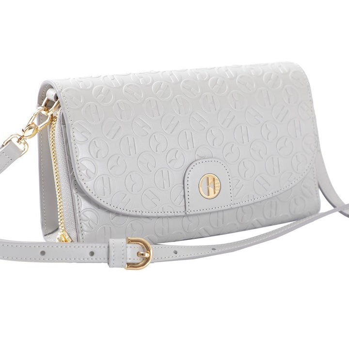 ELLE  Phone Wallet Bag  กระเป๋าธนบัตรใส่โทรศัพท์มือถือ   หนังวัวแท้ 100%  มี 2 สี รุ่น EWW114225 ICCSHOPPING