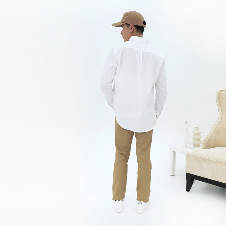 ELLE HOMME เสื้อเชิ้ตแขนยาว สีพื้น ชายโค้ง สีขาว รุ่น W8B685 ELLE HOMME